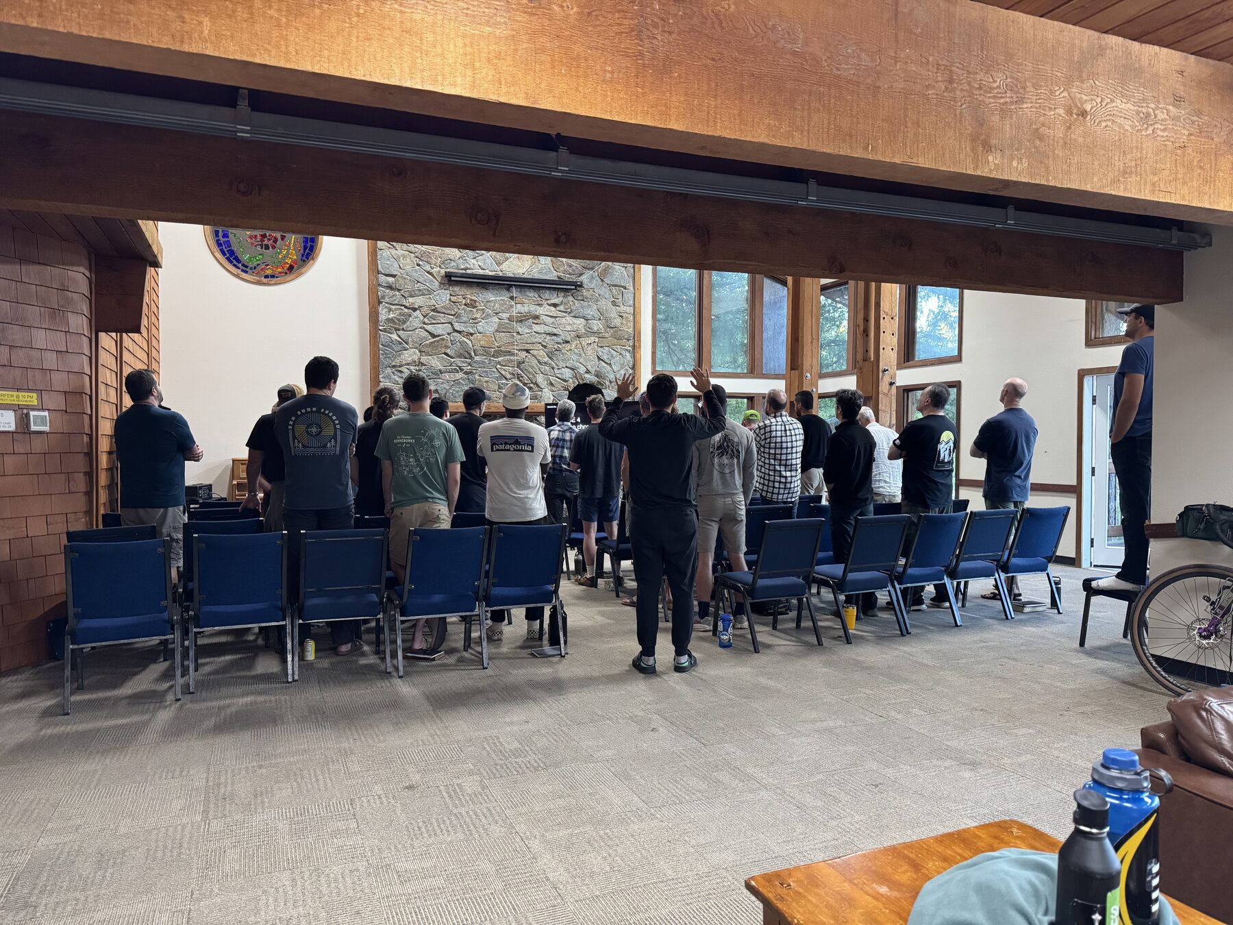 Group of men gathered together in worship at last year's retreat